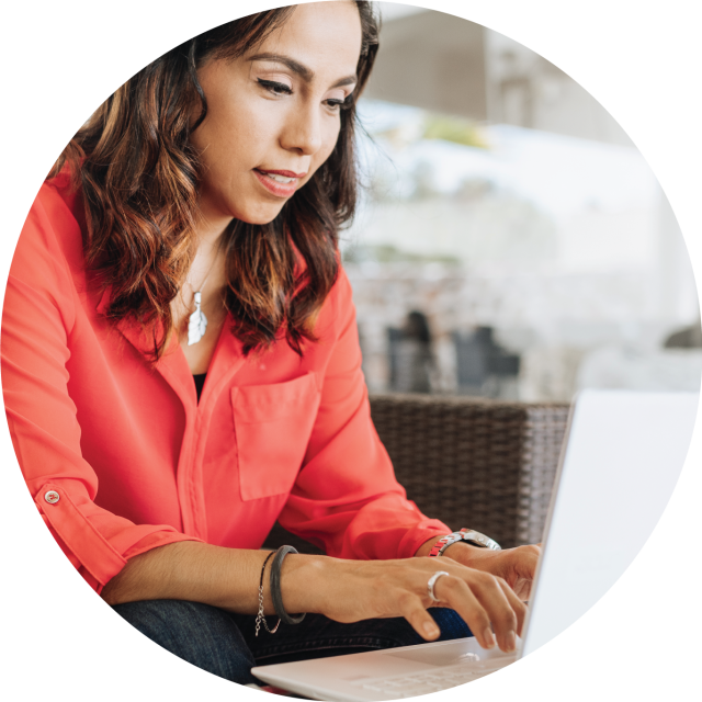 Woman typing on laptop