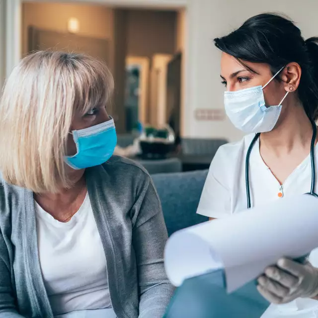 Doctor explaining medical charts to patient