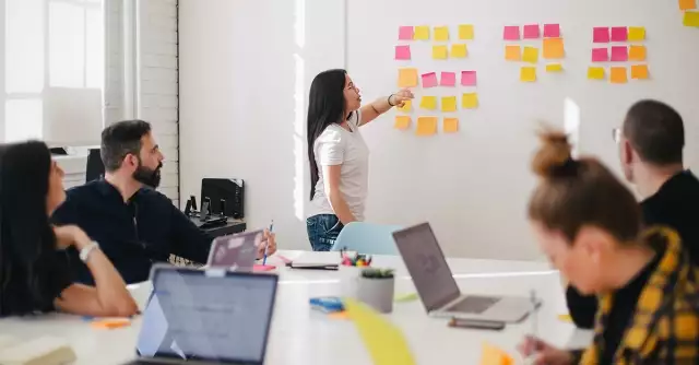 Team brainstorming in conference room