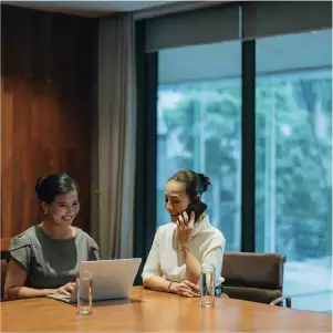 Two women in office