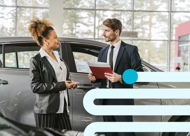 Car salespeople in dealership