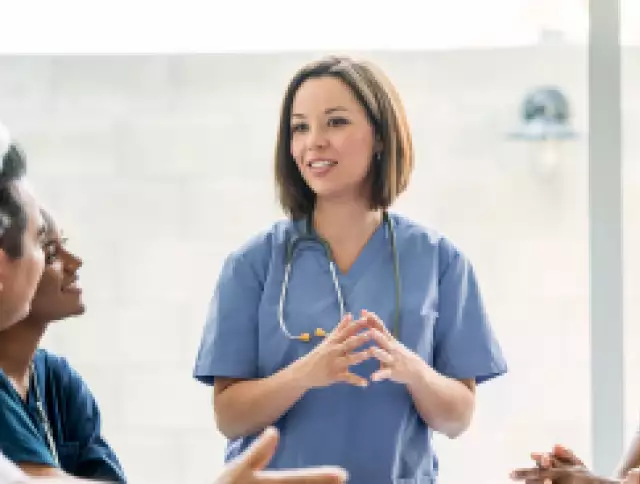 Doctors and nurses having a team meeting