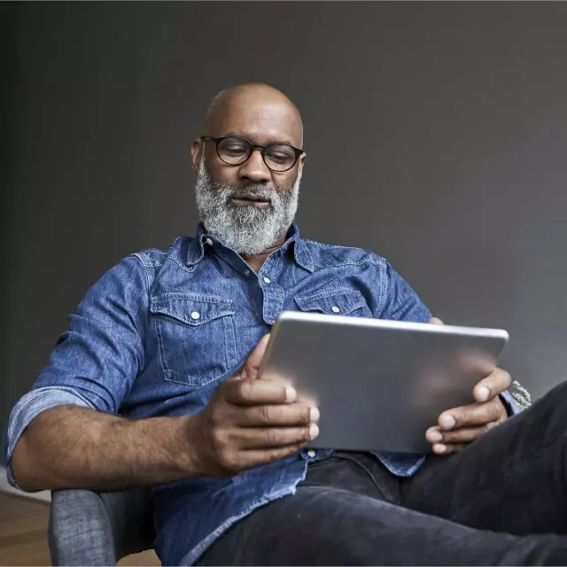 Man using Conga CLM on tablet