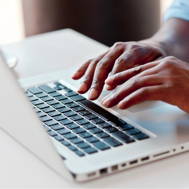 Man typing while using Conga Collaborate