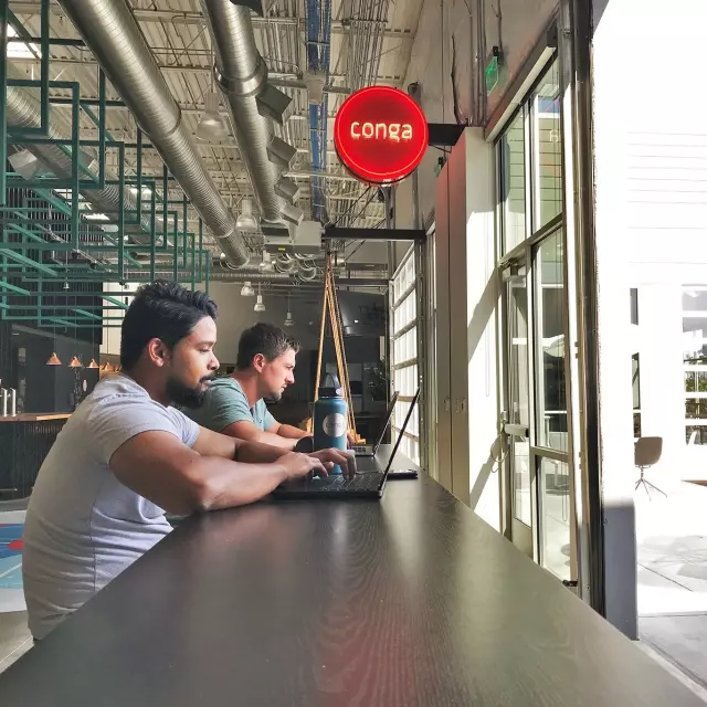 Employees working at the Conga Broomfield office