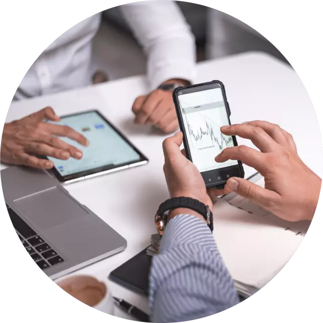 Man looking at graph on cell phone