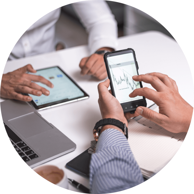 Man looking at graph on cell phone