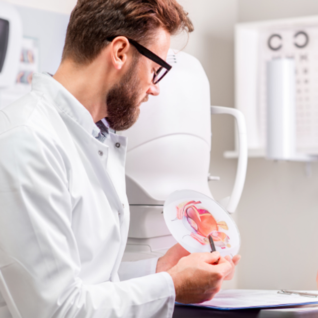 Optometrist using machinery