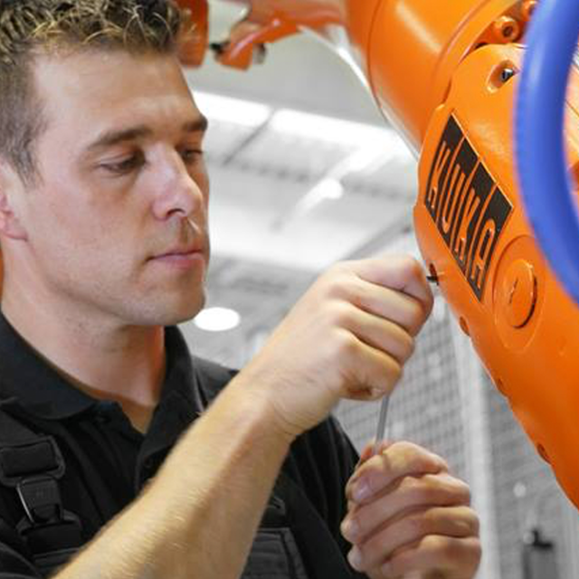 Man using KUKA machinery