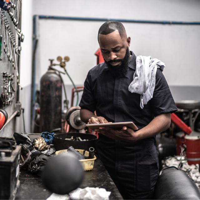Mechanic using tablet