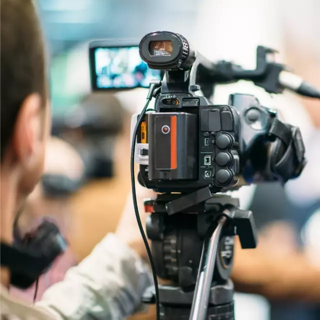 Media worker using video camera