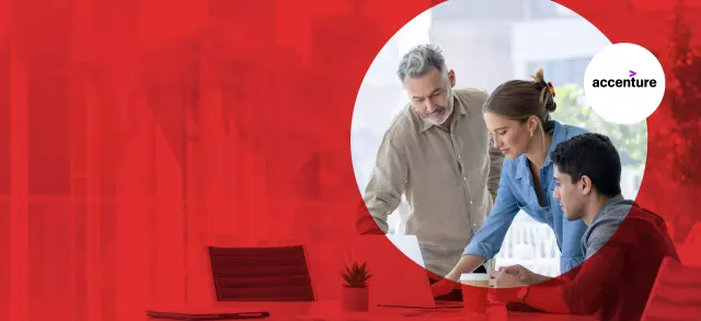 Coworkers looking at laptop and the Accenture logo