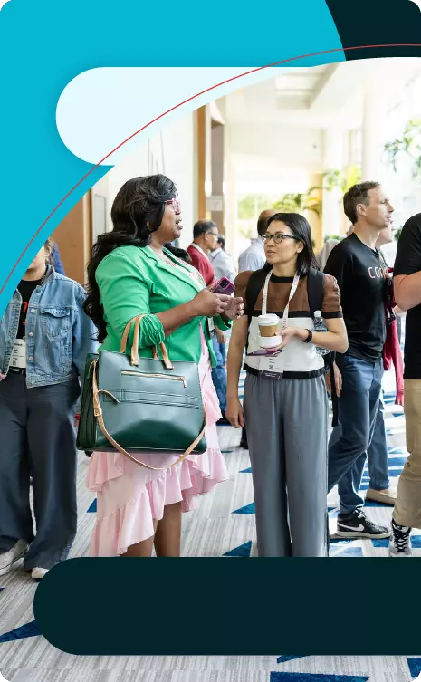 Conga customers smiling at a conference