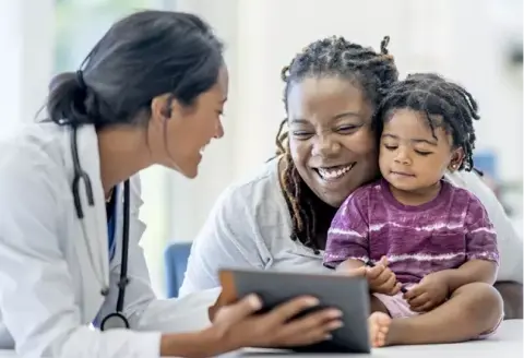Doctor talking to patients