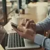 Man using smart phone