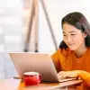 Woman using laptop