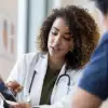 Doctor working with team