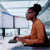 Woman looking at revenue data